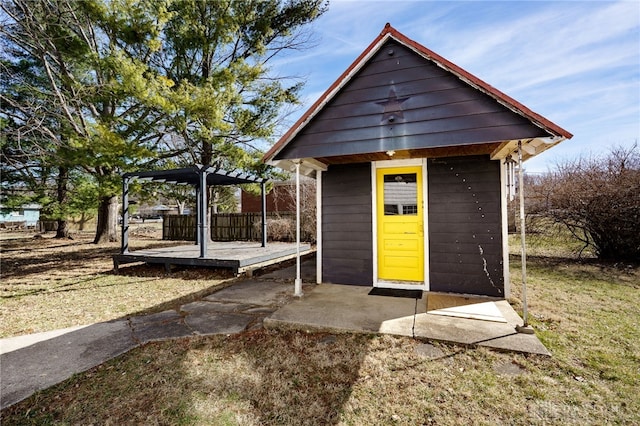 view of outdoor structure featuring an outdoor structure and a pergola