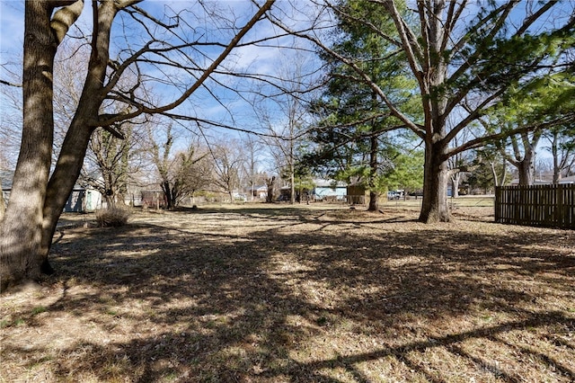 view of yard with fence