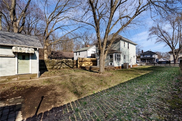 view of yard featuring cooling unit and a fenced backyard