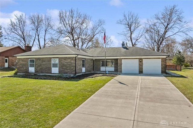 ranch-style home featuring a front yard, roof with shingles, an attached garage, concrete driveway, and brick siding