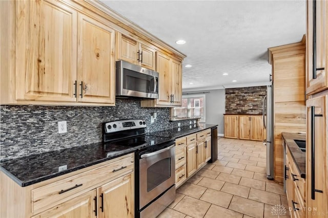 kitchen featuring light tile patterned floors, light brown cabinets, recessed lighting, decorative backsplash, and appliances with stainless steel finishes