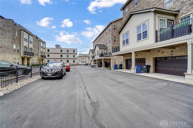 view of road with a residential view