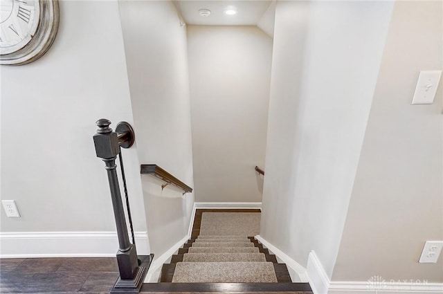 stairway with baseboards