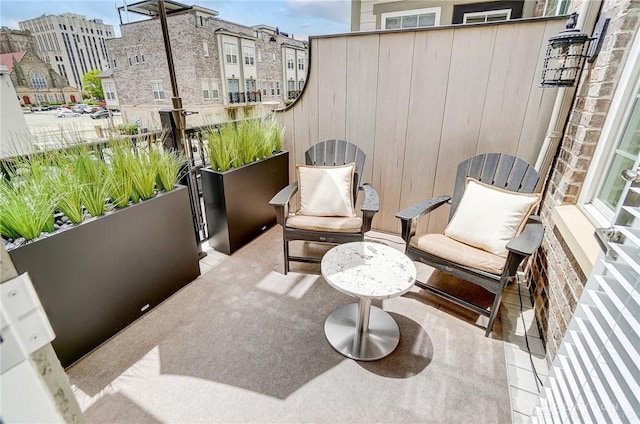 view of patio with a balcony