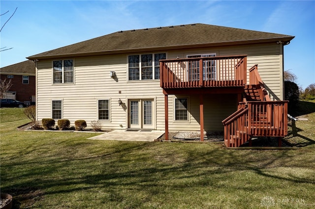 back of house featuring a patio, roof with shingles, a yard, stairs, and a deck