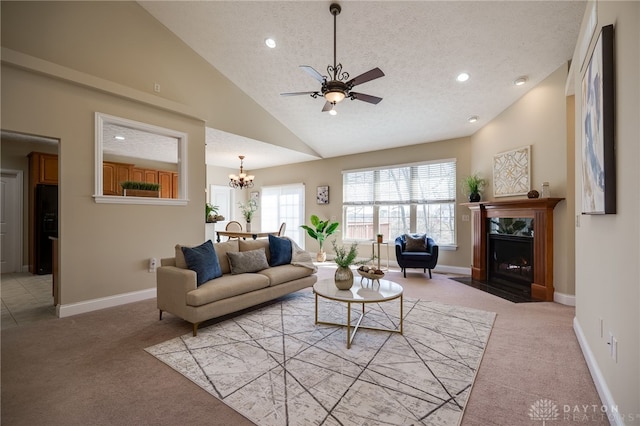 living room featuring a textured ceiling, recessed lighting, a fireplace, baseboards, and light colored carpet