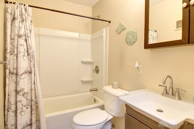 bathroom with vanity, toilet, and shower / bathtub combination with curtain