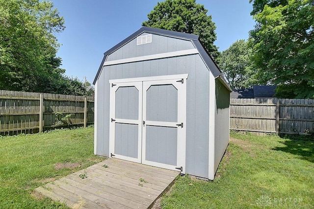 view of shed featuring a fenced backyard