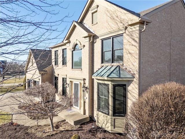 view of front of property with brick siding