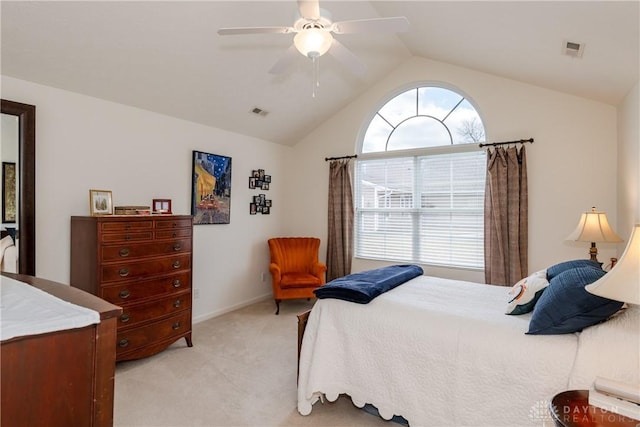 bedroom with light carpet, visible vents, multiple windows, and vaulted ceiling