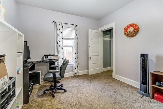 home office with carpet and baseboards