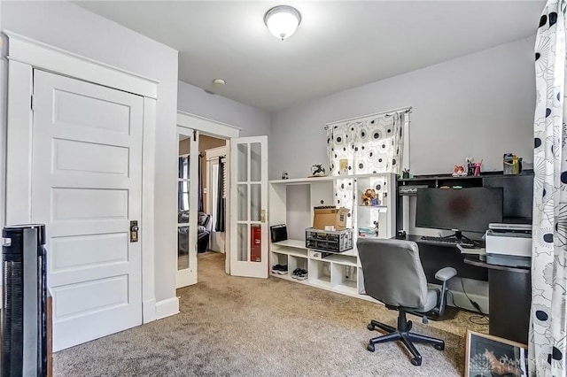 home office featuring carpet flooring and french doors