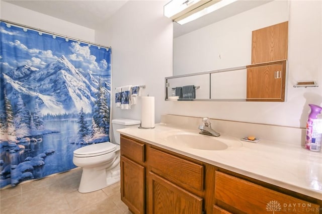 bathroom with tile patterned flooring, a shower with shower curtain, toilet, and vanity