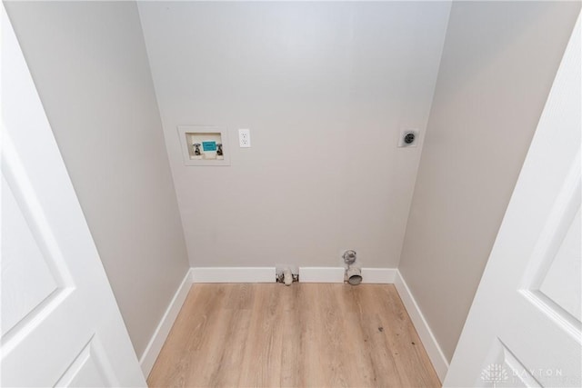 laundry room with laundry area, hookup for a washing machine, gas dryer hookup, and baseboards