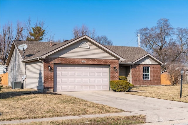 single story home featuring brick siding, a front lawn, concrete driveway, cooling unit, and an attached garage