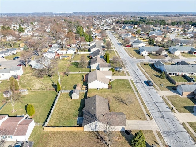 birds eye view of property with a residential view