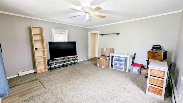 134 S Harrison St, New Madison, OH 45346 - living room featuring a baseboard heating unit, ceiling fan, ornamental molding, and carpet floors