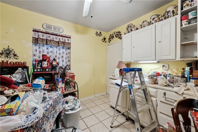 kitchen featuring open shelves, white cabinets, light tile patterned flooring, light countertops, and ceiling fan