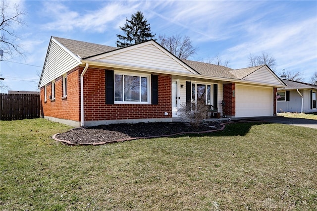 ranch-style house featuring fence, an attached garage, a front lawn, aphalt driveway, and brick siding