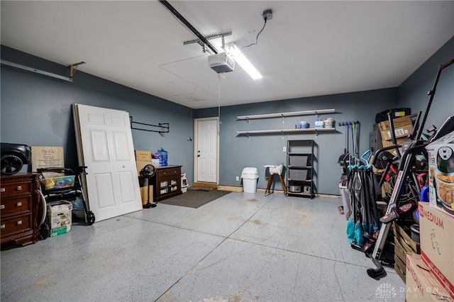 garage featuring a garage door opener