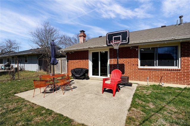 view of patio featuring fence