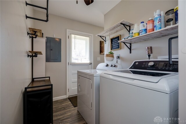 laundry area with washer and dryer, laundry area, electric panel, and dark wood finished floors