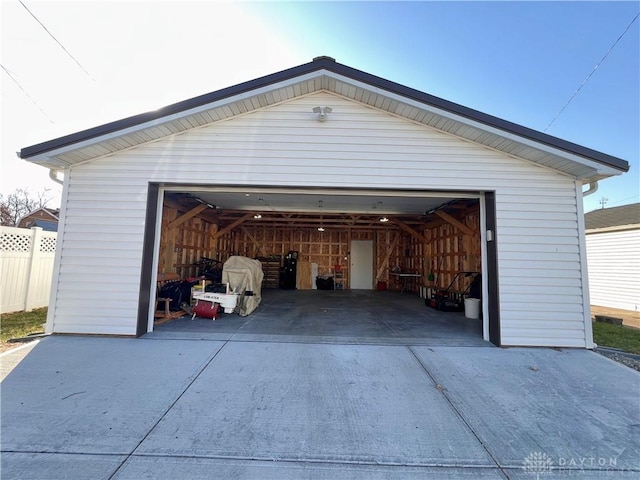 detached garage with fence