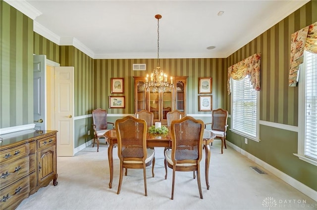 dining room with visible vents, wallpapered walls, baseboards, light colored carpet, and a notable chandelier