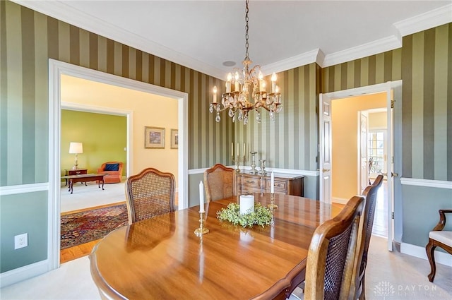 dining area featuring wallpapered walls, crown molding, and baseboards