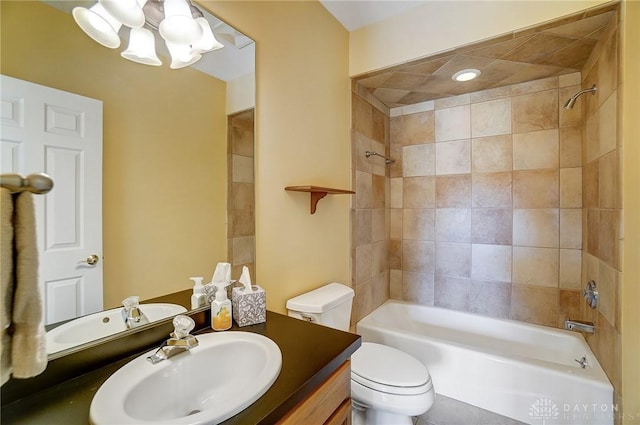 bathroom featuring vanity, toilet, a chandelier, and shower / washtub combination