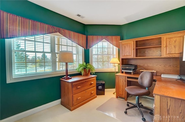 office featuring visible vents and baseboards