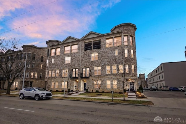 view of property at dusk