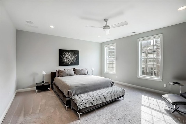 carpeted bedroom with recessed lighting, baseboards, and ceiling fan