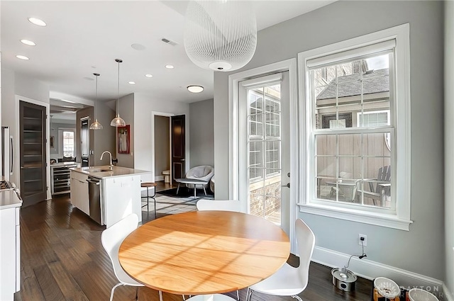 dining area with visible vents, recessed lighting, wine cooler, baseboards, and dark wood-style flooring