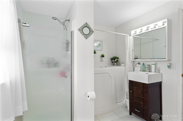 full bathroom with vanity, a tub, and a stall shower