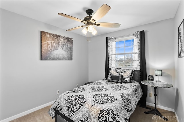 bedroom featuring baseboards, carpet, and ceiling fan