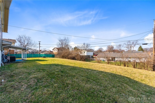 view of yard featuring central AC unit