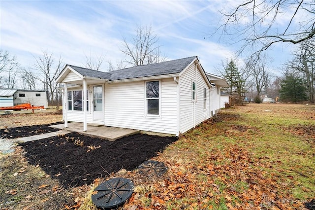 view of home's exterior with a patio