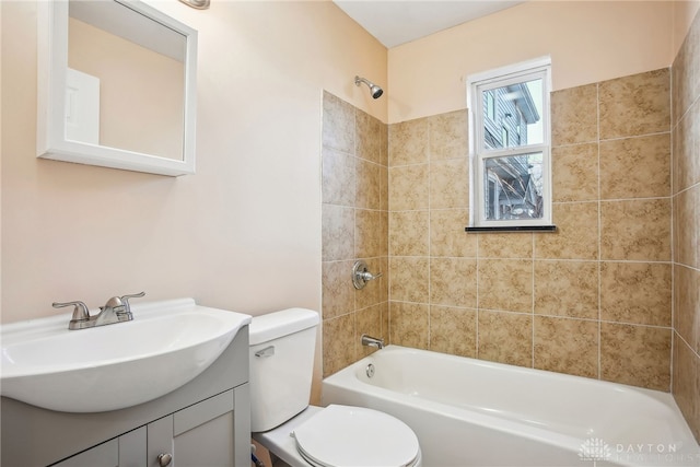 full bath featuring vanity, toilet, and shower / bathing tub combination