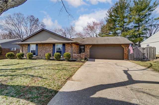 ranch-style home featuring fence, driveway, a front lawn, a garage, and brick siding