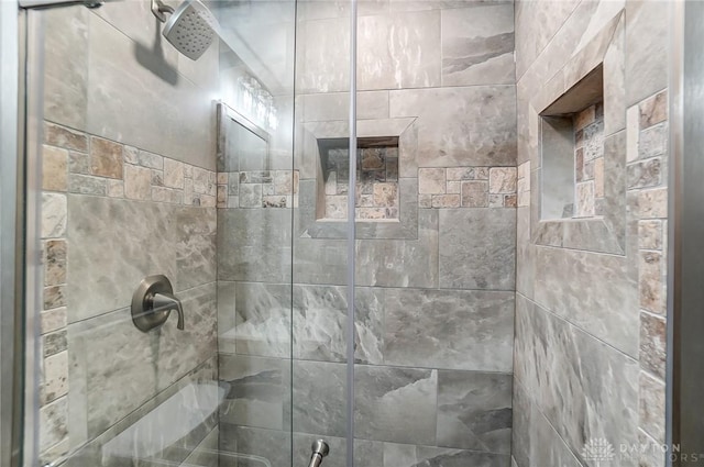 bathroom featuring a stall shower