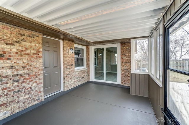 unfurnished sunroom with a healthy amount of sunlight