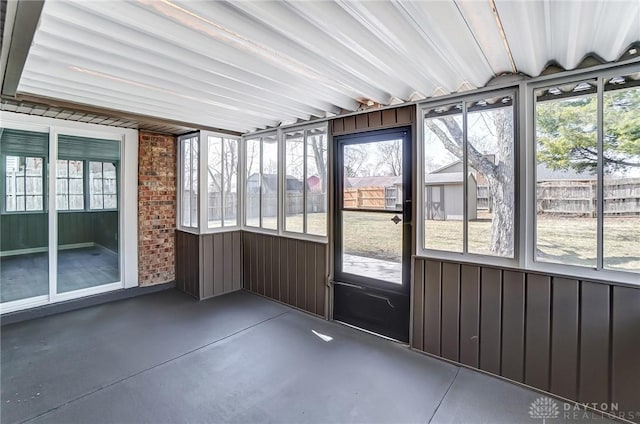 unfurnished sunroom with a wealth of natural light