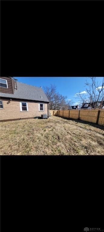 view of yard with a fenced backyard