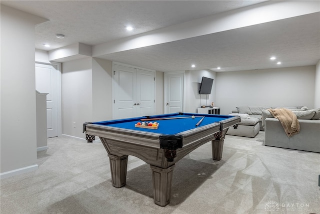 playroom with recessed lighting, baseboards, light carpet, and a textured ceiling