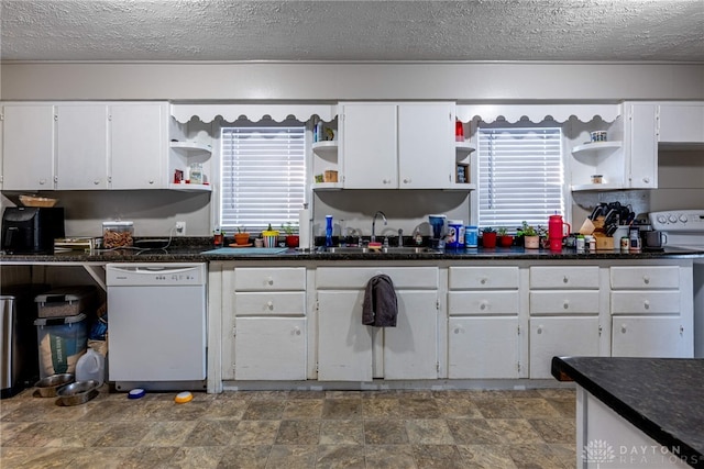 kitchen featuring white appliances, open shelves, a sink, white cabinetry, and dark countertops