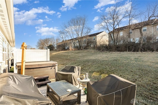 view of yard featuring a patio and a hot tub