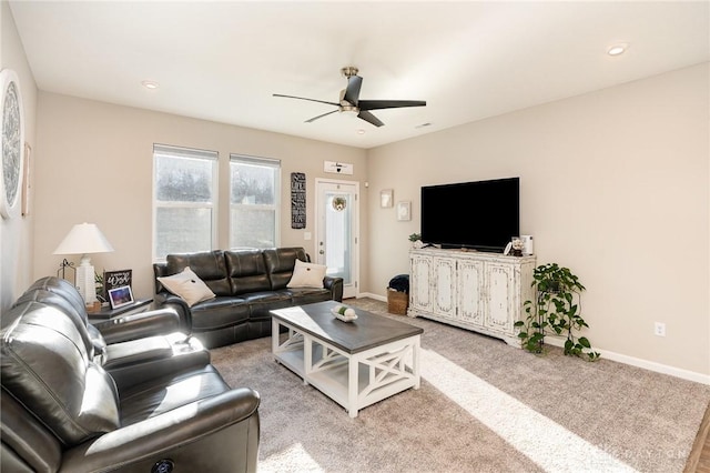 living room featuring carpet flooring, recessed lighting, baseboards, and a ceiling fan