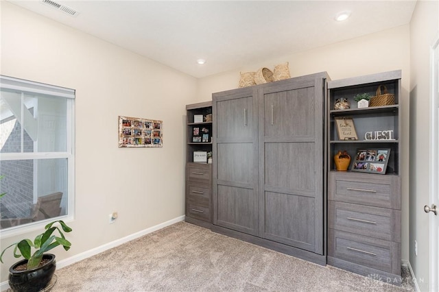 interior space with recessed lighting, visible vents, baseboards, and carpet