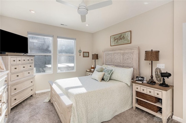 bedroom featuring visible vents, baseboards, light carpet, recessed lighting, and a ceiling fan